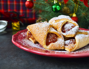 Christmas cookies with jam on a black background 