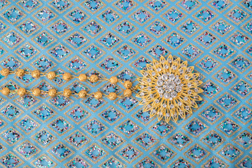 shiny gold jewelry on elegance fabric