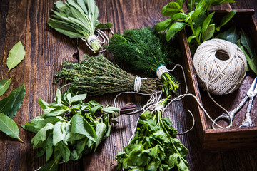 Bunch of fresh herbs on table