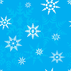 Seamless pattern snowflakes on a blue background