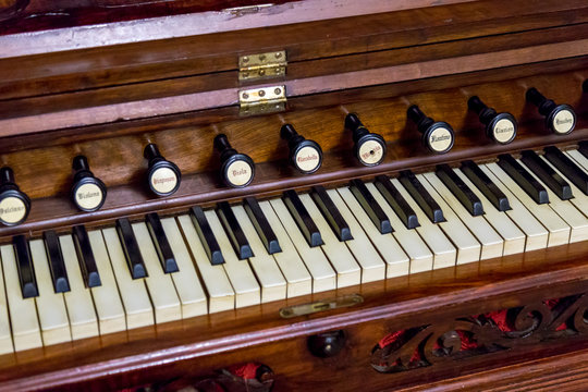 Close-up of antique reed organ harmonium
