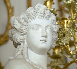 Ancient statue of young woman