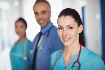 Portrait smiling doctor and nurses