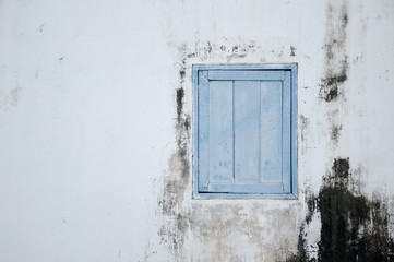 wood window on cement wall