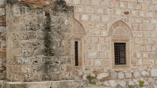 Facade of Bali beg mosque in city of Nis fortress by the day 4K 2160p 30fps UltraHD tilting footage - Slow tilt on detailed ottoman architecture in Eastern Serbia and Balkan 4K 3840X2160 UHD video 