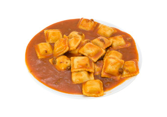 Plate of ravioli on a white background.