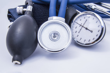 Phonendoscope or stethoscope with chrome large chest piece, sphygmomanometer dial, bulb and folded...