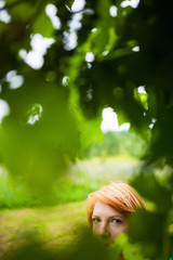  Reddish blonde woman hiding