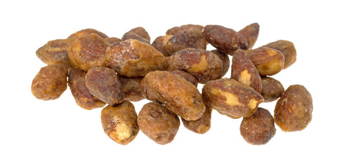 Honey glazed almonds on a white background.