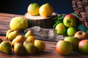 Wild apples on wooden table