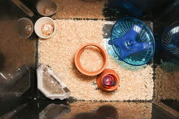 hamster cage with toy accessories