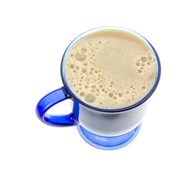 Fat free coffee milk in a blue mug.