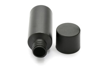 Plastic bottle of body care and beauty products / studio photography of plastic bottle for shampoo - isolated on white background