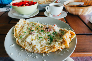 Breakfast with omelet and hot coffee