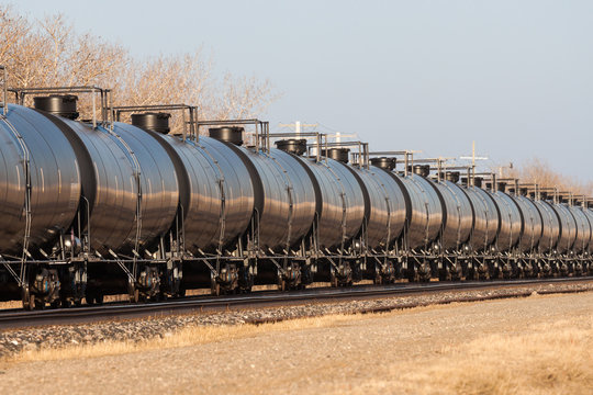 Line of Tank Cars Into Distance