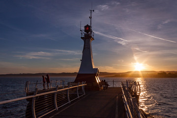 Fototapeta na wymiar Sunset at the Ogden Point Breakwater and Lighthouse