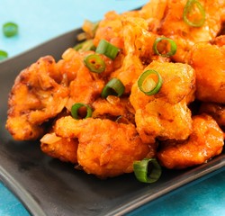Gobi Manchurian - Indo chinese appetizer using cauliflower florets, selective focus