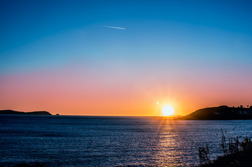 Naklejka premium Atardecer en la costa, Galicia, España