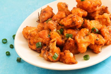 Gobi Manchurian - Indo chinese appetizer using cauliflower florets, selective focus