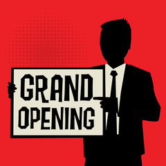 Man showing board, business concept with text Grand Opening