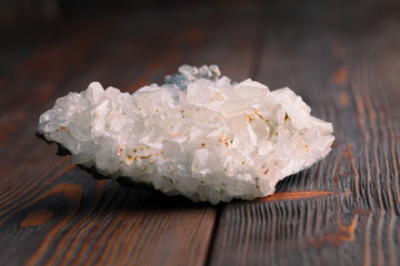 white calcite mineral on the wooden background