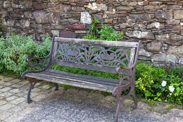 wrought iron bench with  ornament