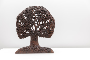 wooden sculpture of tree