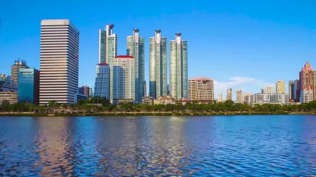 Timelapse of lake in center Bangkok city with office background  Thailand