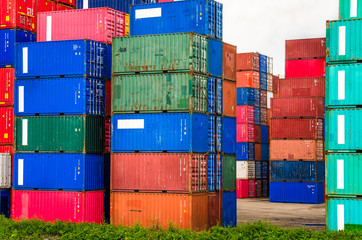 Fototapeta premium Piles of Colourful Containers in a Commercial Port