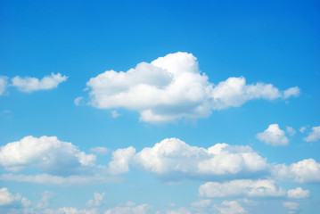 Obraz na płótnie Canvas Blue sky background with tiny clouds