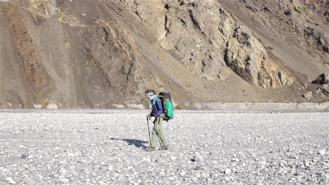 Female explorer on geological expedition