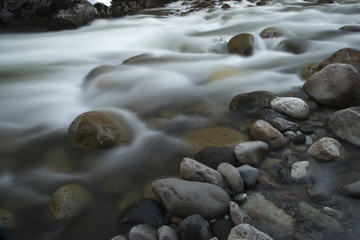 Fototapeta na wymiar Stream flowing through rocks, Whistler, British Columbia, Canada