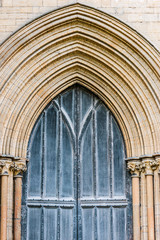 Naklejka premium Peterborough Cathedral front wooden gate detail entrance outdoors