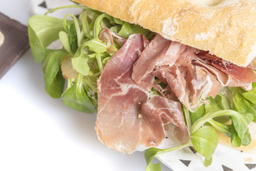 Ham and green salad sandwich breakfast