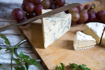 camembert and blue cheese with grapes