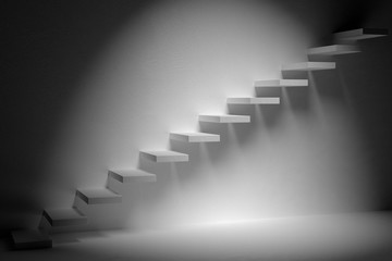 Ascending stairs of rising staircase in dark empty room with spo
