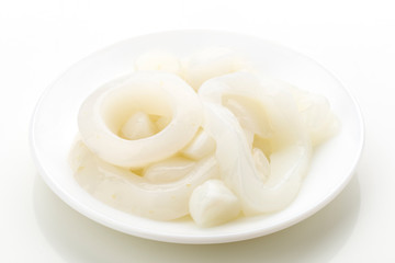 raw squid rings isolated on white