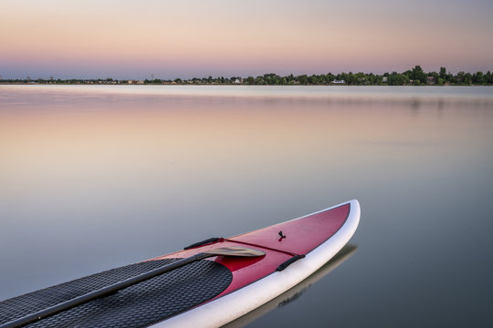 Stand Up Paddleboard On Lake