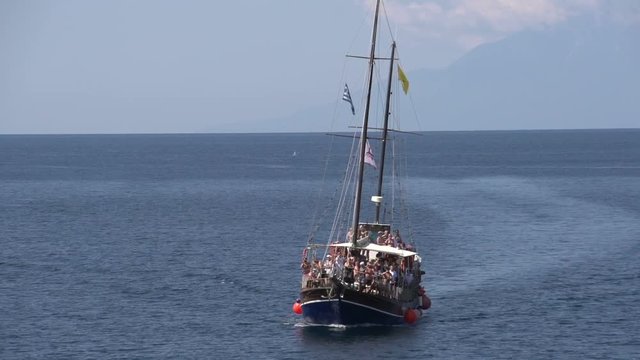 Junk sailboat arriving at giola in Thassos Greece