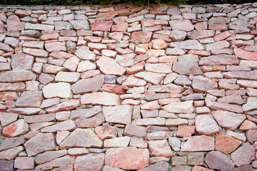 Old ancient wall made from stone.
