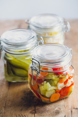 Pickled vegetables in glass jars