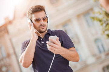 Young man listening to music