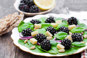 Seasonal  leaf salad with cheese and blackberries