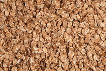 Overview photograph of oat flakes, rolled grains. Healthy lifestyles and nutrition