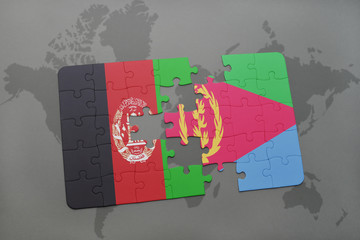 puzzle with the national flag of afghanistan and eritrea on a world map background.