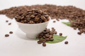 Cup with Beans on White Background