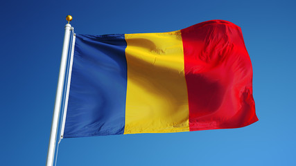 Chad flag waving against clean blue sky, close up, isolated with clipping path mask alpha channel transparency