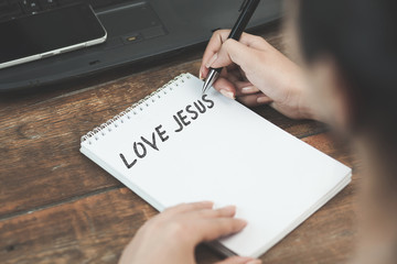 Jesus text on notepad