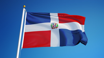 Fototapeta na wymiar Dominican Republic flag waving against clean blue sky, close up, isolated with clipping path mask alpha channel transparency