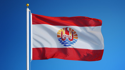 French Polynesia flag waving against clean blue sky, close up, isolated with clipping path mask alpha channel transparency